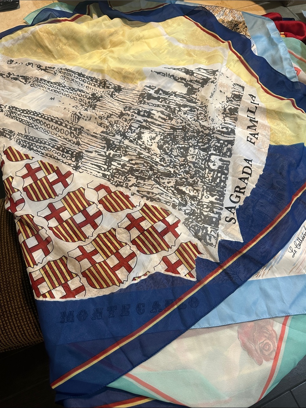 Assorted vintage souvenir scarves from Europe
